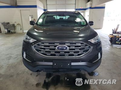 Piąte zdjęcie samochodu w środku: 2020 FORD EDGE TITANIUM VIN:2FMPK3K94LBB35292 - miniatura