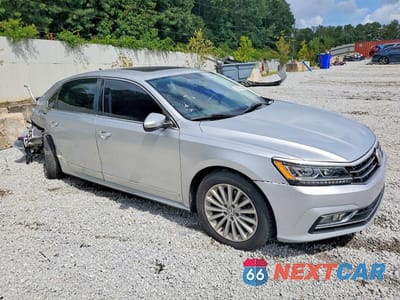 Czwarte zdjęcie samochodu z boku: 2017 VOLKSWAGEN PASSAT SE VIN:1VWBT7A3XHC019812 - miniatura