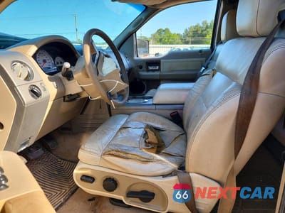 Zdjęcie 7 z 13 samochodu: 2004 FORD F150 VIN:1FTPX12554NC26889 - miniatura