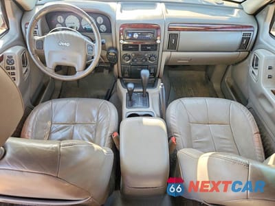 Zdjęcie 8 z 12 samochodu: 2002 JEEP GRAND CHEROKEE LIMITED VIN:1J8GW58NX2C257879 - miniatura
