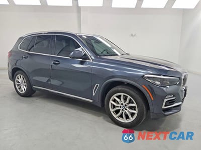 Czwarte zdjęcie samochodu z boku: 2021 BMW X5 XDRIVE40I VIN:5UXCR6C06M9E38168 - miniatura
