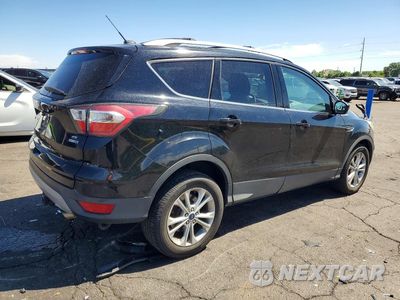 Trzecie zdjęcie samochodu z tyłu: 2017 FORD ESCAPE SE VIN:1FMCU9G99HUA95474 - miniatura