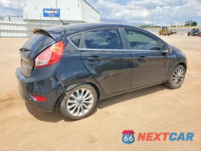 Trzecie zdjęcie samochodu z tyłu: 2018 FORD FIESTA TITANIUM VIN:3FADP4FJ9JM102227 - miniatura