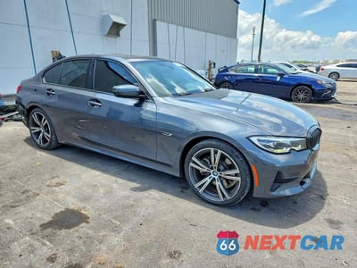 Czwarte zdjęcie samochodu z boku: 2022 BMW 330E VIN:WBA5P7C05NFL65779 - miniatura