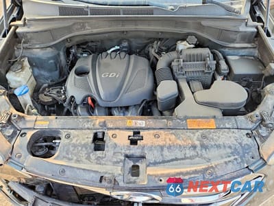 Zdjęcie 12 z 13 samochodu: 2013 HYUNDAI SANTA FE SPORT 2.4L VIN:5XYZUDLB5DG025508 - miniatura
