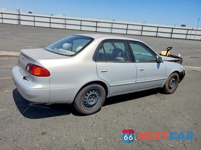 Trzecie zdjęcie samochodu z tyłu: 2002 TOYOTA COROLLA LE VIN:1NXBR12E22Z584227 - miniatura