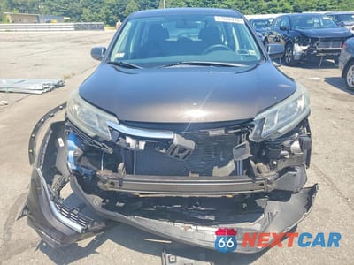 Piąte zdjęcie samochodu w środku: 2015 HONDA CR-V LX VIN:2HKRM4H38FH694014 - miniatura