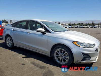 Czwarte zdjęcie samochodu z boku: 2019 FORD FUSION SE VIN:3FA6P0HDXKR193411 - miniatura