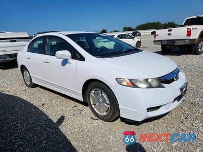 Czwarte zdjęcie samochodu z boku: 2011 HONDA CIVIC HYBRID VIN:JHMFA3F29BS000134 - miniatura