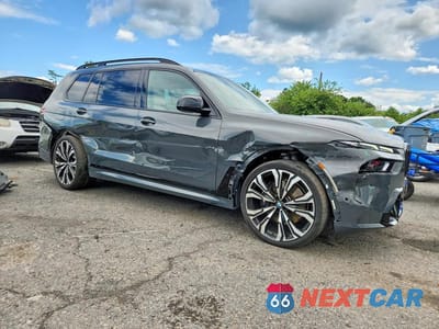 Czwarte zdjęcie samochodu z boku: 2024 BMW X7 M60I VIN:5UX33EM01R9T61501 - miniatura