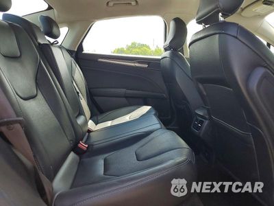 Zdjęcie 10 z 12 samochodu: 2016 FORD FUSION TITANIUM PHEV VIN:3FA6P0SU7GR316470 - miniatura