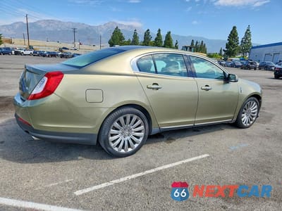 Trzecie zdjęcie samochodu z tyłu: 2013 LINCOLN MKS VIN:1LNHL9DK4DG603925 - miniatura