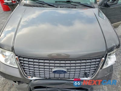 Zdjęcie 12 z 13 samochodu: 2003 FORD EXPEDITION XLT VIN:1FMPU16LX3LA95496 - miniatura