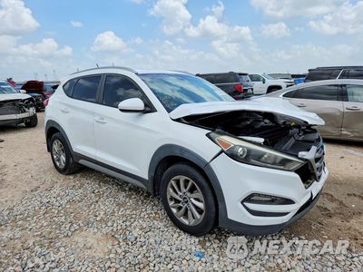 Czwarte zdjęcie samochodu z boku: 2017 HYUNDAI TUCSON SE VIN:KM8J33A44HU273215 - miniatura