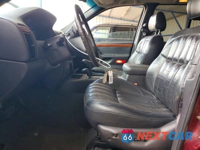 Zdjęcie 7 z 13 samochodu: 1999 JEEP GRAND CHEROKEE LIMITED VIN:1J4GW68N0XC597654 - miniatura