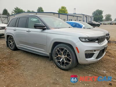 Czwarte zdjęcie samochodu z boku: 2022 JEEP GRAND CHEROKEE SUMMIT VIN:1C4RJHET9N8590407 - miniatura
