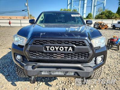 Piąte zdjęcie samochodu w środku: 2019 TOYOTA TACOMA SR5 V6 VIN:3TMDZ5BN4KM070789 - miniatura
