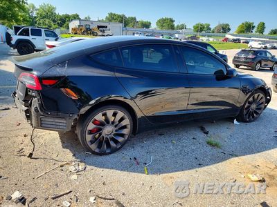 Trzecie zdjęcie samochodu z tyłu: 2023 TESLA MODEL 3 VIN:5YJ3E1EC2PF579639 - miniatura