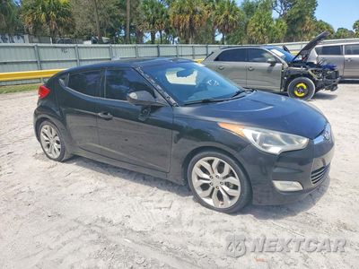 Czwarte zdjęcie samochodu z boku: 2013 HYUNDAI VELOSTER BASE VIN:KMHTC6AD9DU130880 - miniatura