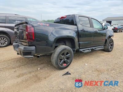Trzecie zdjęcie samochodu z tyłu: 2019 CHEVROLET COLORADO LT VIN:1GCGTCEN4K1200775 - miniatura