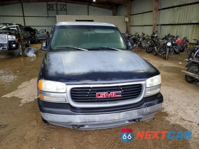 Piąte zdjęcie samochodu w środku: 1999 GMC NEW SIERRA C1500 VIN:1GTEC14W1XZ510705 - miniatura