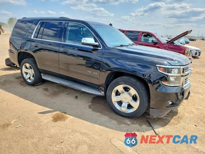 Czwarte zdjęcie samochodu z boku: 2015 CHEVROLET TAHOE K1500 LTZ VIN:1GNSKCKC5FR104040 - miniatura