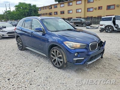 Czwarte zdjęcie samochodu z boku: 2017 BMW X1 SDRIVE28I VIN:WBXHU7C3XH5H38124 - miniatura