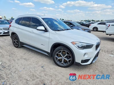 Czwarte zdjęcie samochodu z boku: 2018 BMW X1 SDRIVE28I VIN:WBXHU7C32J5H45915 - miniatura
