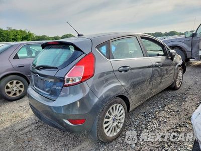 Trzecie zdjęcie samochodu z tyłu: 2015 FORD FIESTA TITANIUM VIN:3FADP4FJ8FM144069 - miniatura