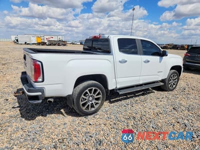 Trzecie zdjęcie samochodu z tyłu: 2018 GMC CANYON DENALI VIN:1GTG6EEN8J1310911 - miniatura