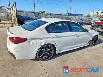Trzecie zdjęcie samochodu z tyłu: 2023 BMW M550XI VIN:WBA13BK06PCM40203 - miniatura