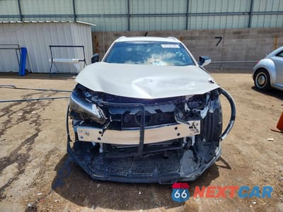 Piąte zdjęcie samochodu w środku: 2023 LEXUS UX 250H PREMIUM VIN:JTHP6JBH4P2159509 - miniatura