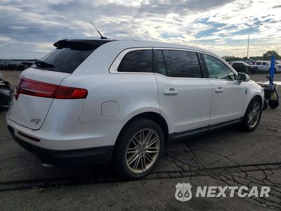 Trzecie zdjęcie samochodu z tyłu: 2017 LINCOLN MKT VIN:2LMHJ5AT5HBL01086 - miniatura