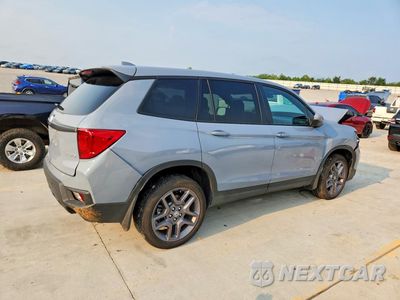 Trzecie zdjęcie samochodu z tyłu: 2023 HONDA PASSPORT EXL VIN:5FNYF8H5XPB021787 - miniatura