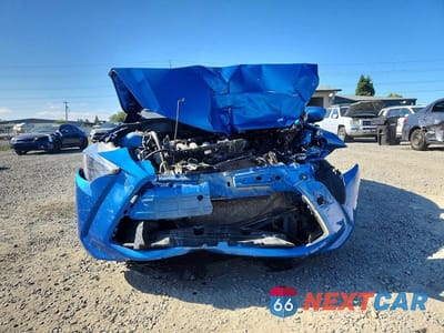 Piąte zdjęcie samochodu w środku: 2018 TOYOTA YARIS IA BASE VIN:3MYDLBYV1JY323082 - miniatura
