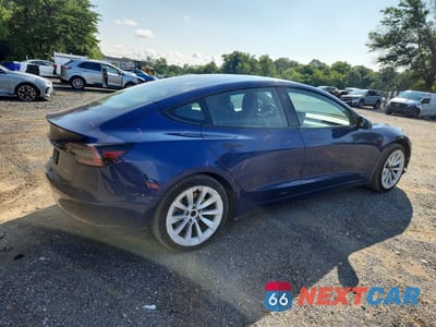 Trzecie zdjęcie samochodu z tyłu: 2022 TESLA MODEL 3 VIN:5YJ3E1EB9NF289757 - miniatura