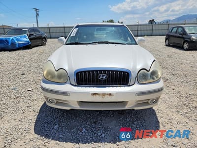 Piąte zdjęcie samochodu w środku: 2003 HYUNDAI SONATA GLS VIN:KMHWF35H43A838437 - miniatura