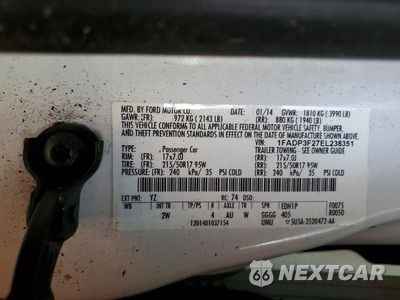 Zdjęcie 12 z 12 samochodu: 2014 FORD FOCUS SE VIN:1FADP3F27EL238351 - miniatura