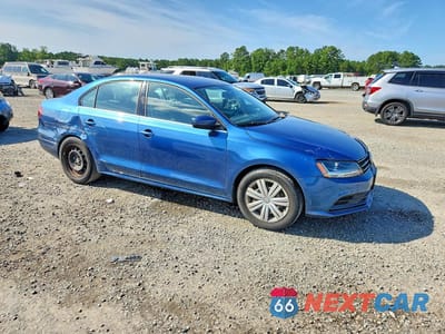 Czwarte zdjęcie samochodu z boku: 2017 VOLKSWAGEN JETTA S VIN:3VW2B7AJ2HM345636 - miniatura