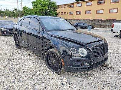 Czwarte zdjęcie samochodu z boku: 2017 BENTLEY BENTAYGA VIN:SJAAC2ZV9HC013881 - miniatura