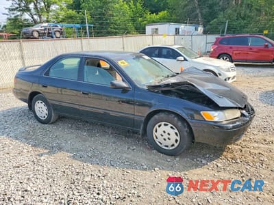 Czwarte zdjęcie samochodu z boku: 1997 TOYOTA CAMRY LE VIN:4T1BG22K0VU769530 - miniatura