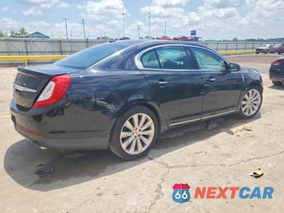 Trzecie zdjęcie samochodu z tyłu: 2015 LINCOLN MKS VIN:1LNHL9FT0FG600755 - miniatura