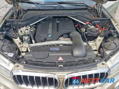 Zdjęcie 12 z 13 samochodu: 2014 BMW X5 XDRIVE35I VIN:5UXKR0C58E0K50775 - miniatura