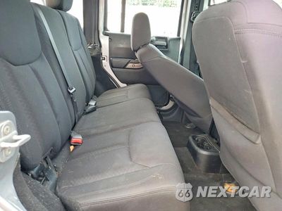 Zdjęcie 10 z 12 samochodu: 2013 JEEP WRANGLER UNLIMITED SPORT VIN:1C4BJWDG2DL705824 - miniatura