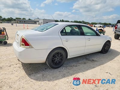 Trzecie zdjęcie samochodu z tyłu: 2007 FORD FUSION S VIN:3FAHP06Z57R234882 - miniatura