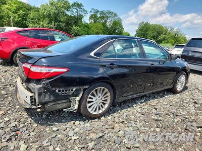 Trzecie zdjęcie samochodu z tyłu: 2016 TOYOTA CAMRY HYBRID LE VIN:4T1BD1FK4GU195773 - miniatura