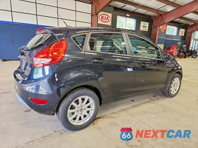 Trzecie zdjęcie samochodu z tyłu: 2011 FORD FIESTA SE VIN:3FADP4EJXBM113000 - miniatura