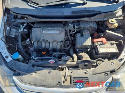 Zdjęcie 11 z 12 samochodu: 2010 HONDA INSIGHT EX VIN:JHMZE2H76AS009702 - miniatura