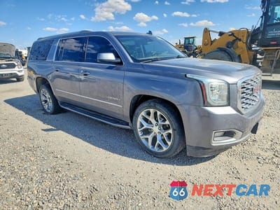 Czwarte zdjęcie samochodu z boku: 2018 GMC YUKON XL DENALI VIN:1GKS2HKJXJR198689 - miniatura