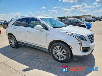 Czwarte zdjęcie samochodu z boku: 2017 CADILLAC XT5 VIN:1GYKNARS9HZ104878 - miniatura
